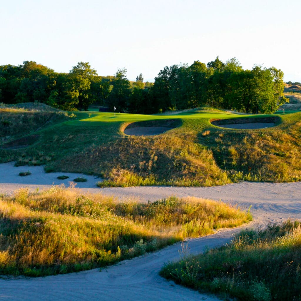Looking at a par three with elevated green at Eagle's Nest Golf Club, Maple, Ontario, Canada