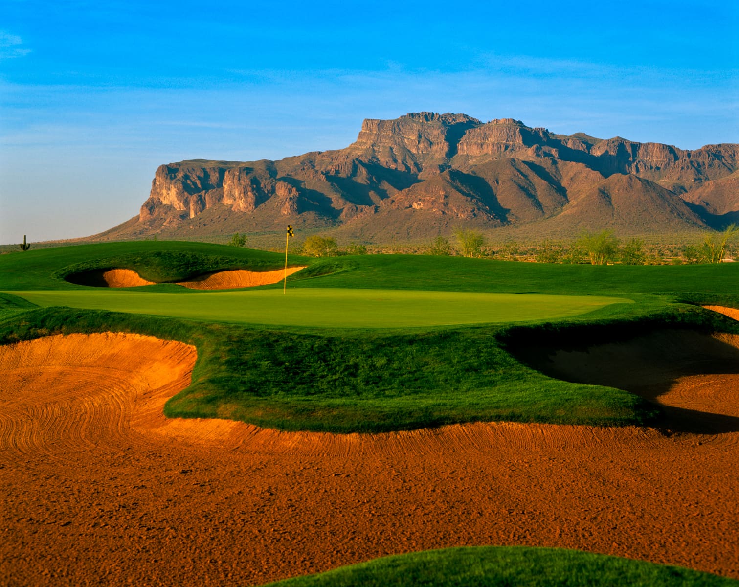 Golf course photograph of Superstition Mountain Country Club in Arizona, featuring desert bunkers, green contours, and mountain backdrops.